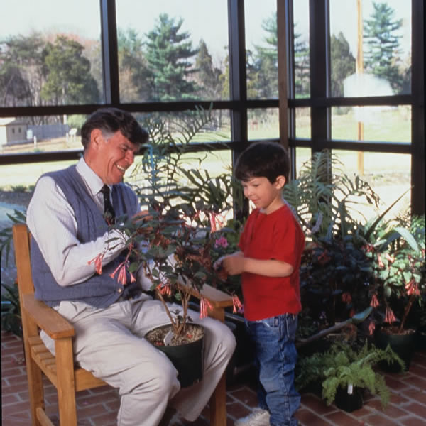 Don Humphrey with young visitor - late 1990's